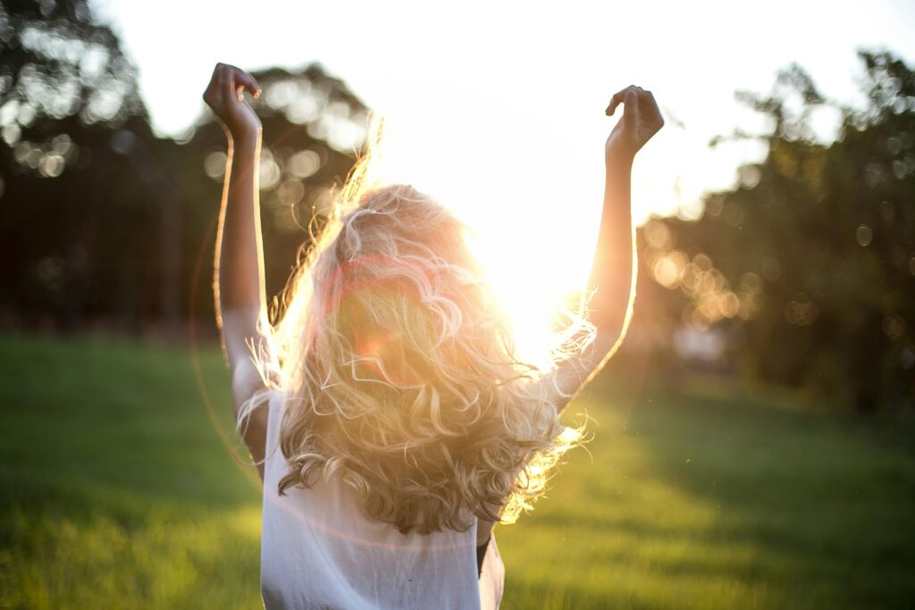 Woman with arms in the air